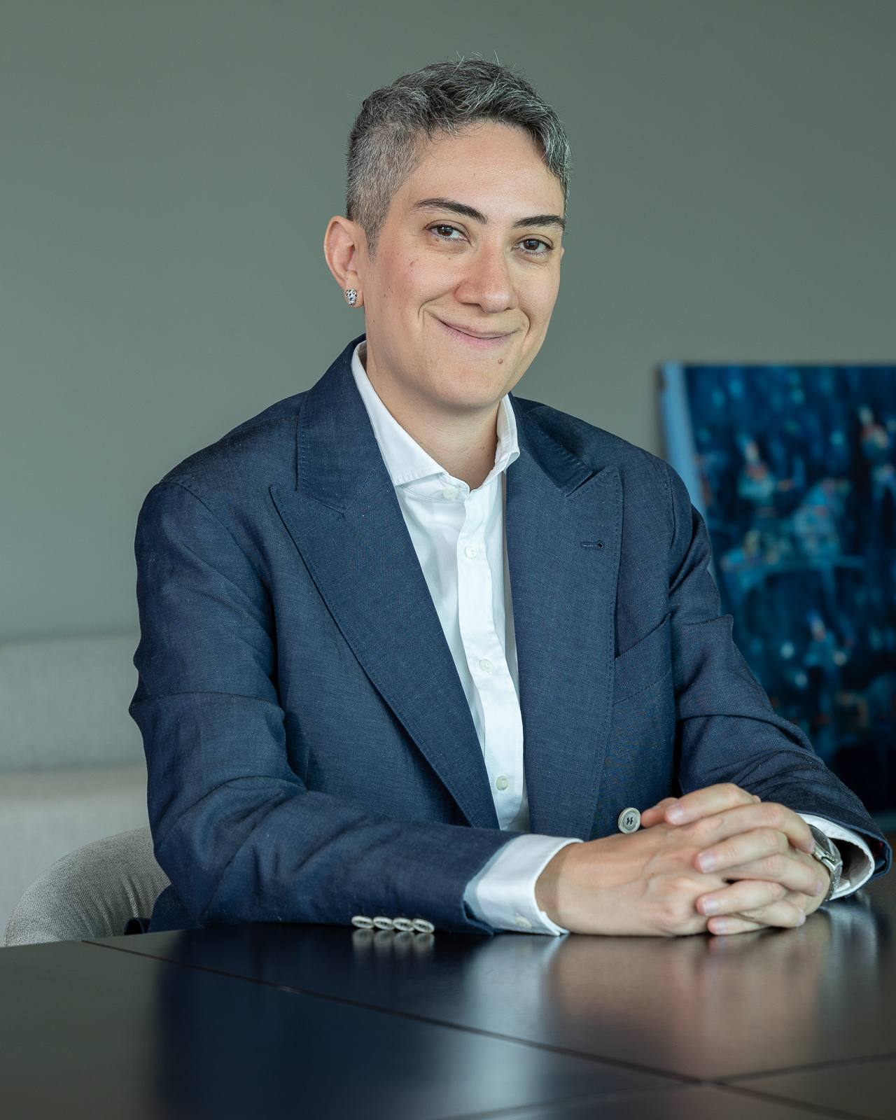 Honey Deylami, Executive Partner at Dubai Sotheby's International Realty, in a navy suit
